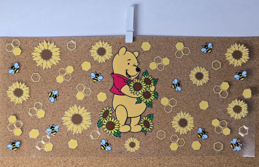 Winnie the Pooh with sunflowers