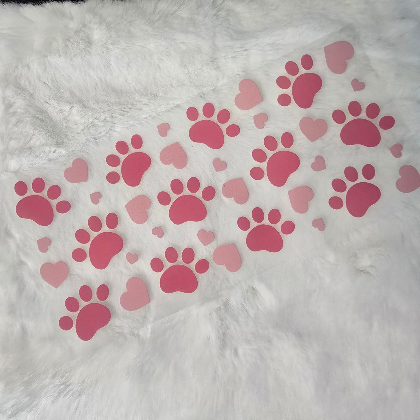 Paw prints with hearts